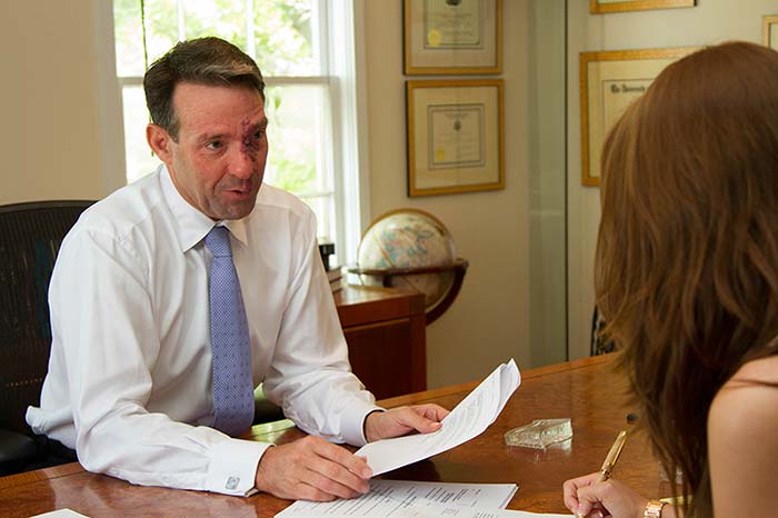 Pete Patterson speaking to client